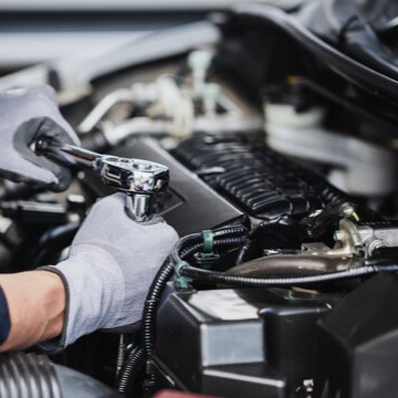 Professional Mechanic repairing a car